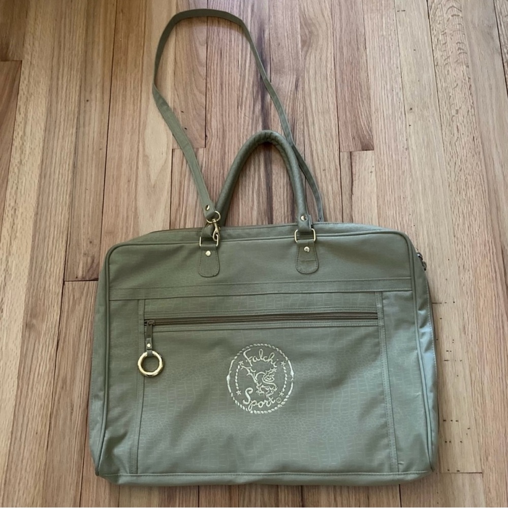 Green Laptop Bag with Shoulder Strap It is designed to store large papers
